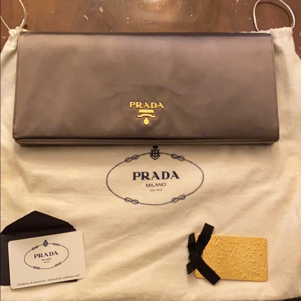 Prada raso gold envelope clutch size: 12.5” x 6”